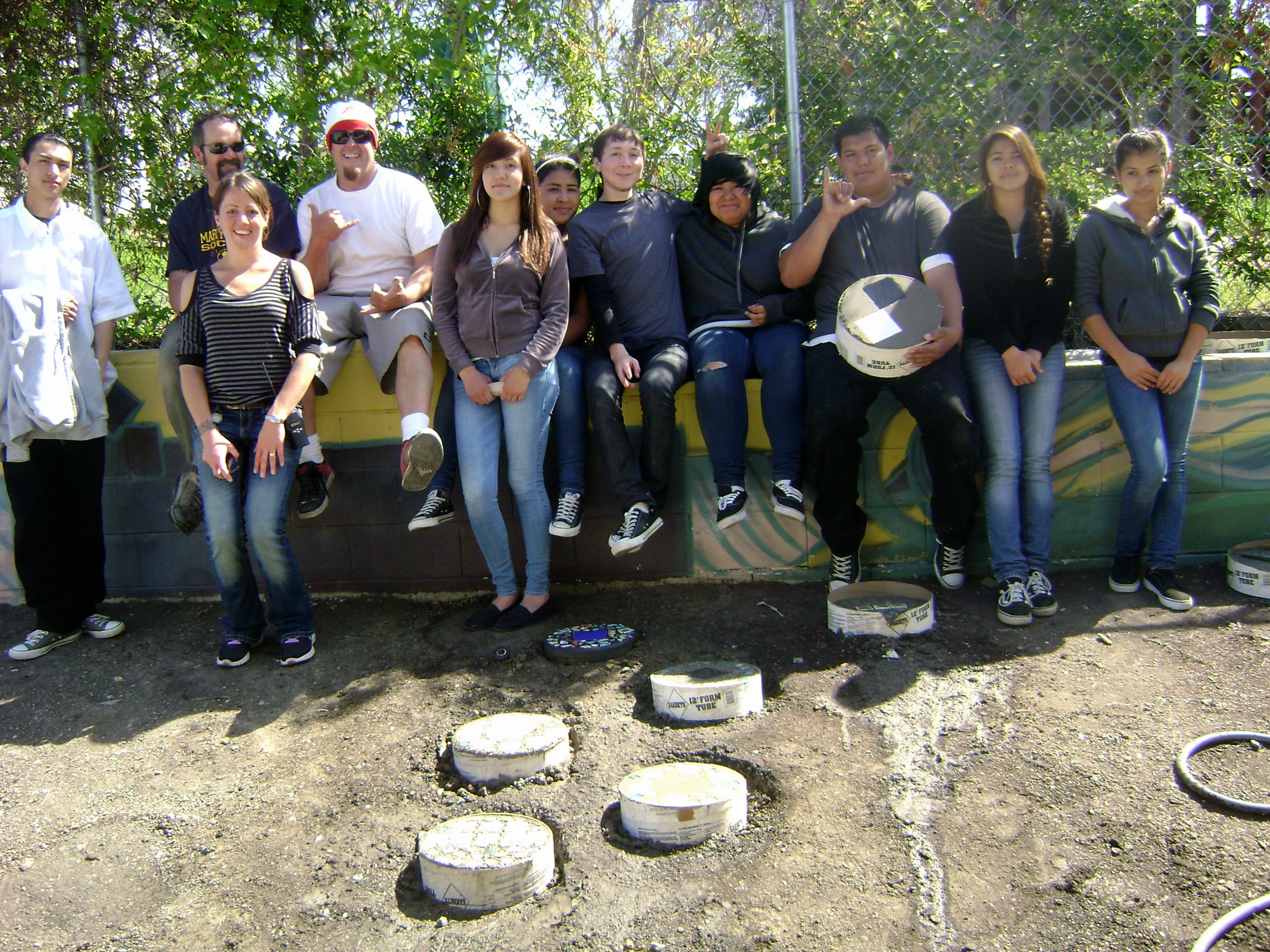 New School students using donated supplies to make stepping stones